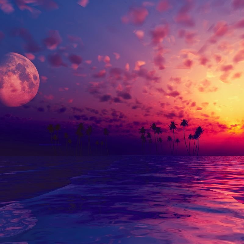Le soleil et la lune sur l'océan