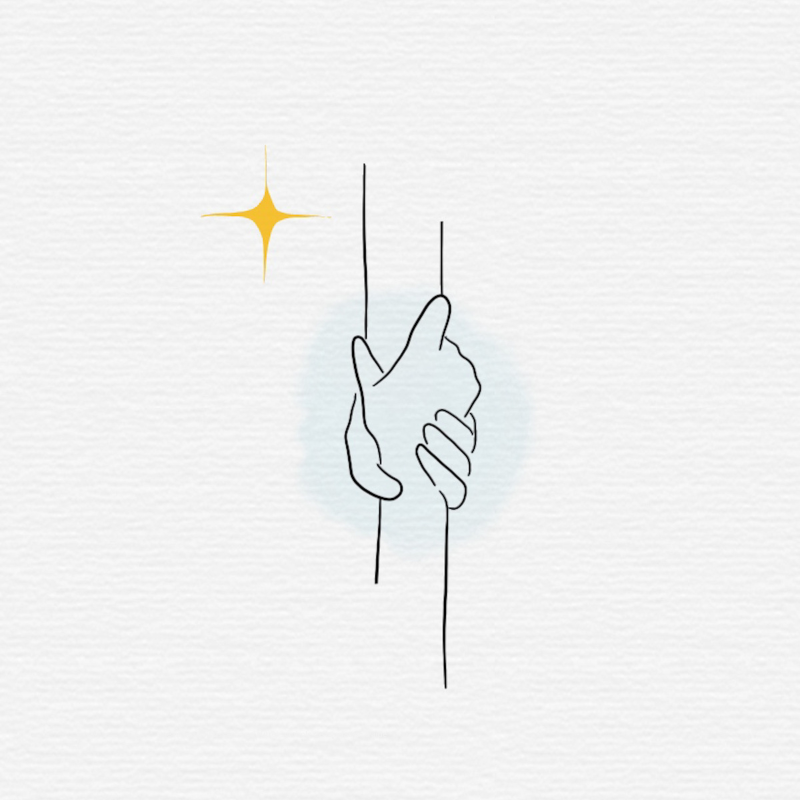 Une mains saississant une autre, symbole de la relation d’aide